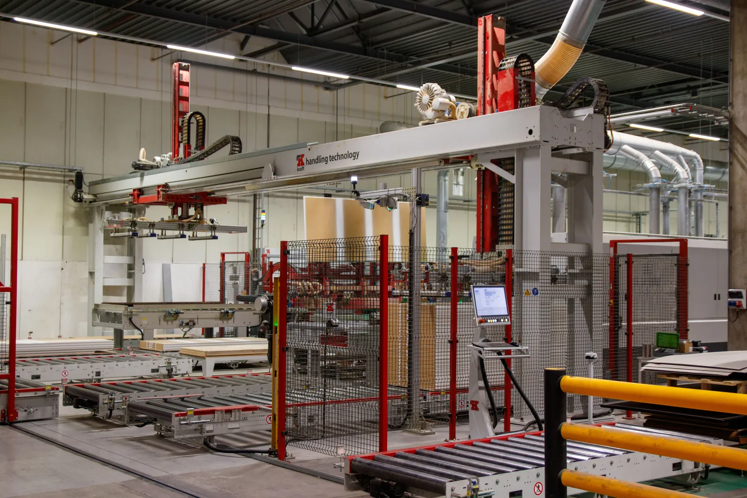 Automated production machinery with gantry handling, conveyors and guarded controls